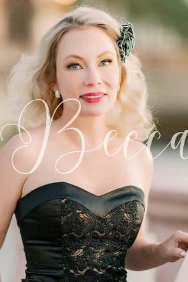 Smiling blonde American women in a cocktail dress